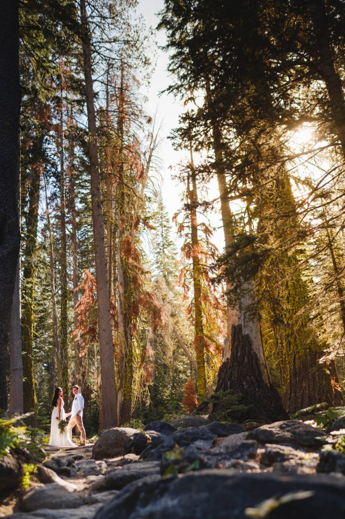 Bride and groom hike to Taft Point in Yosemite Elopement